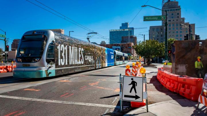 Light rail going through construction zone on Central Avenue and McKinley Street in Downtown Phoenix.