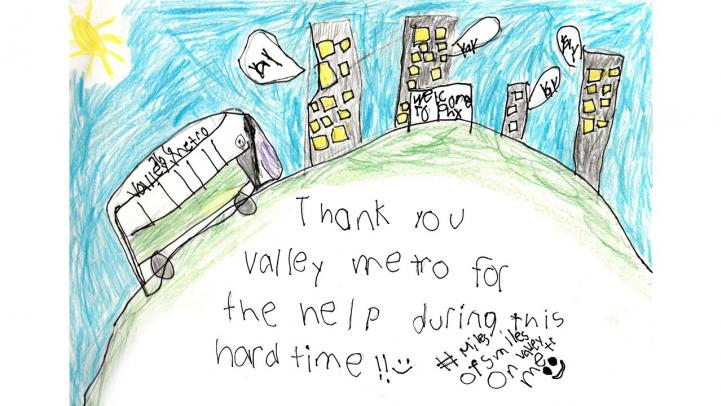 Artwork of a bus driving into the city with the caption "Thank you Valley Metro for the help during this hard time!"