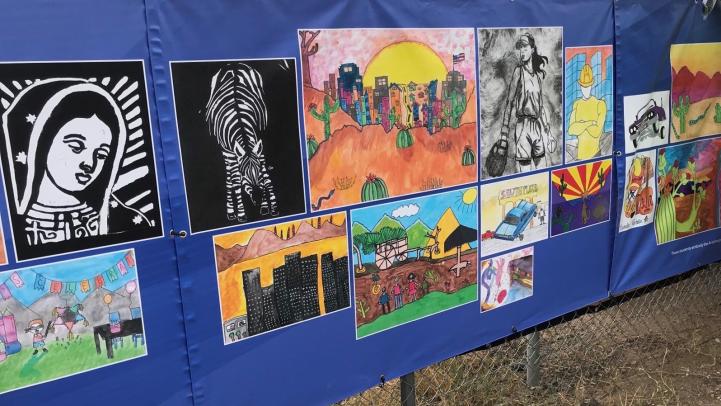 Student artwork banners displayed on Central Ave