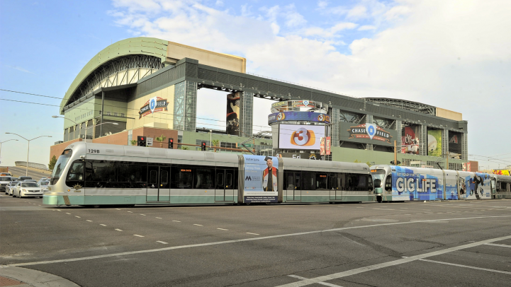Light rail train rides by Chase Field