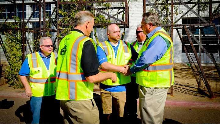 Valley Metro C E O Scott Smith Shake Hands with community memebers