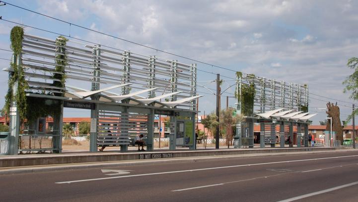 riders wait at the Dorsey/Apache rail station