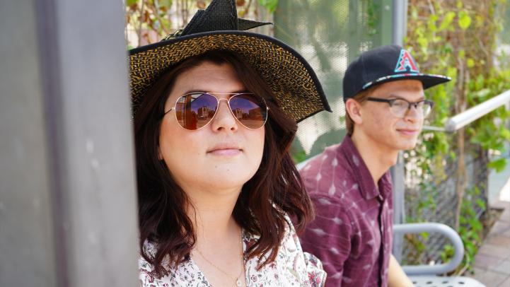 Woman and man with hats