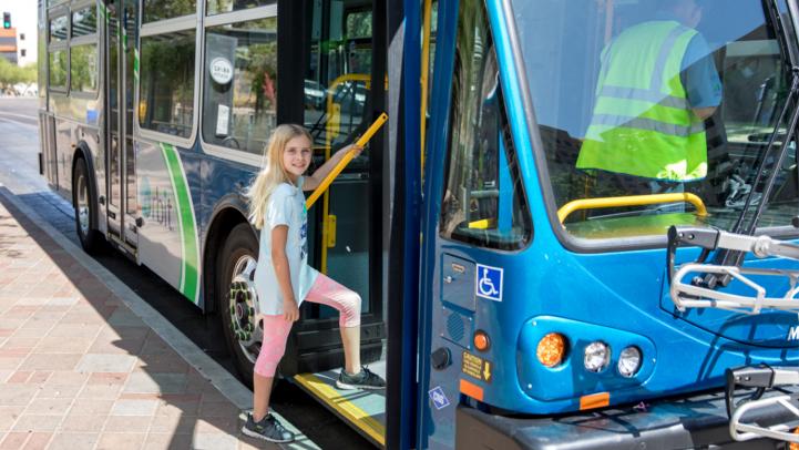 Photo of kid boarding an Orbit bus