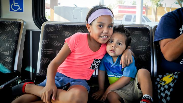 Kids riding Valley Metro bus