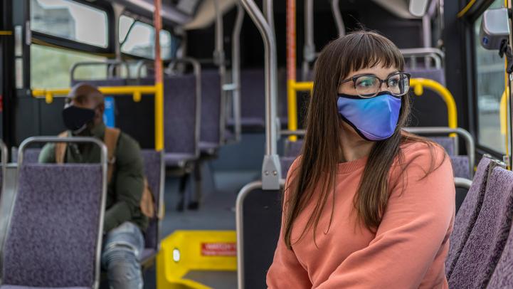 Bus passengers wearing masks
