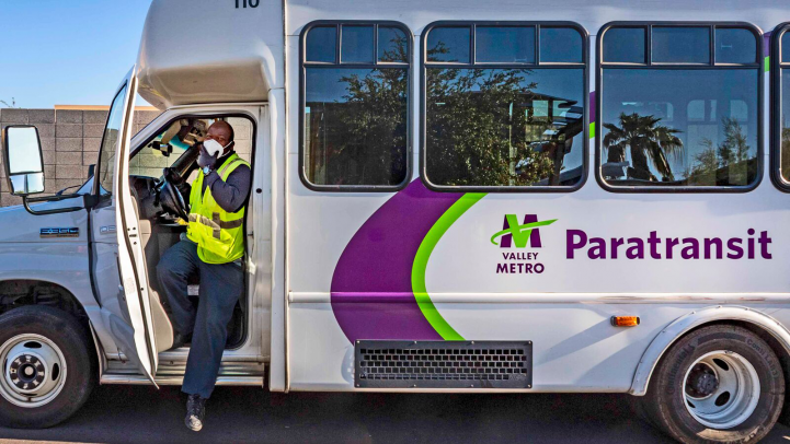 driver exiting paratransit vehicle