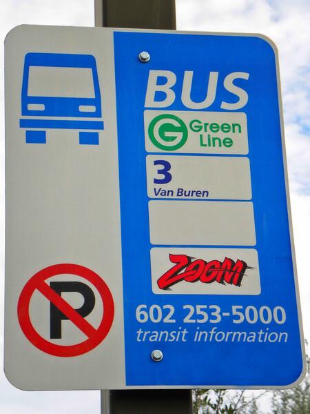 Bus stop sign with routes