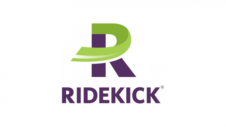 hand holding mobile phone showing Ridekick app hand holding mobile phone showing Ridekick app