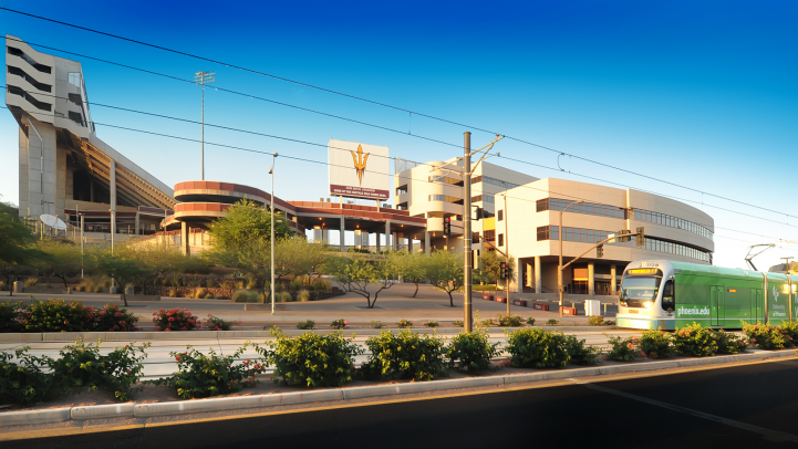 Light rail train rides by Sun Devil Stadium