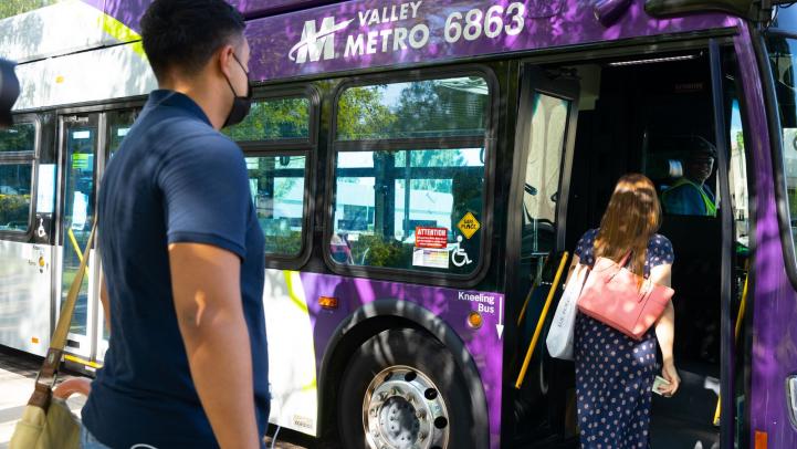 Passengers boarding bus