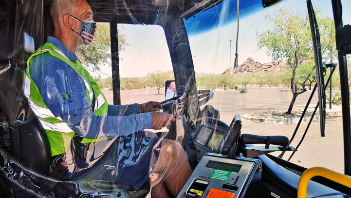 Bus operator with face covering