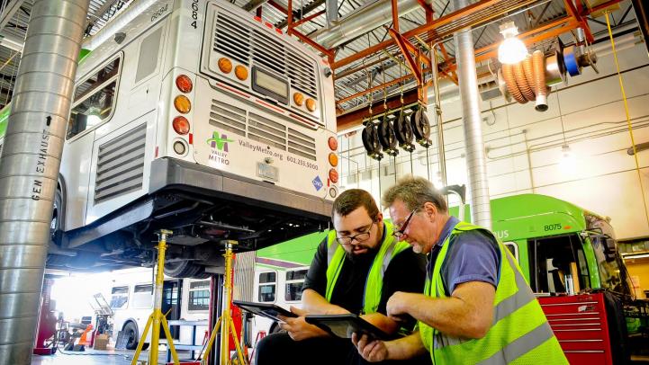 Valley Metro technicians maintain bus air conditioning systems